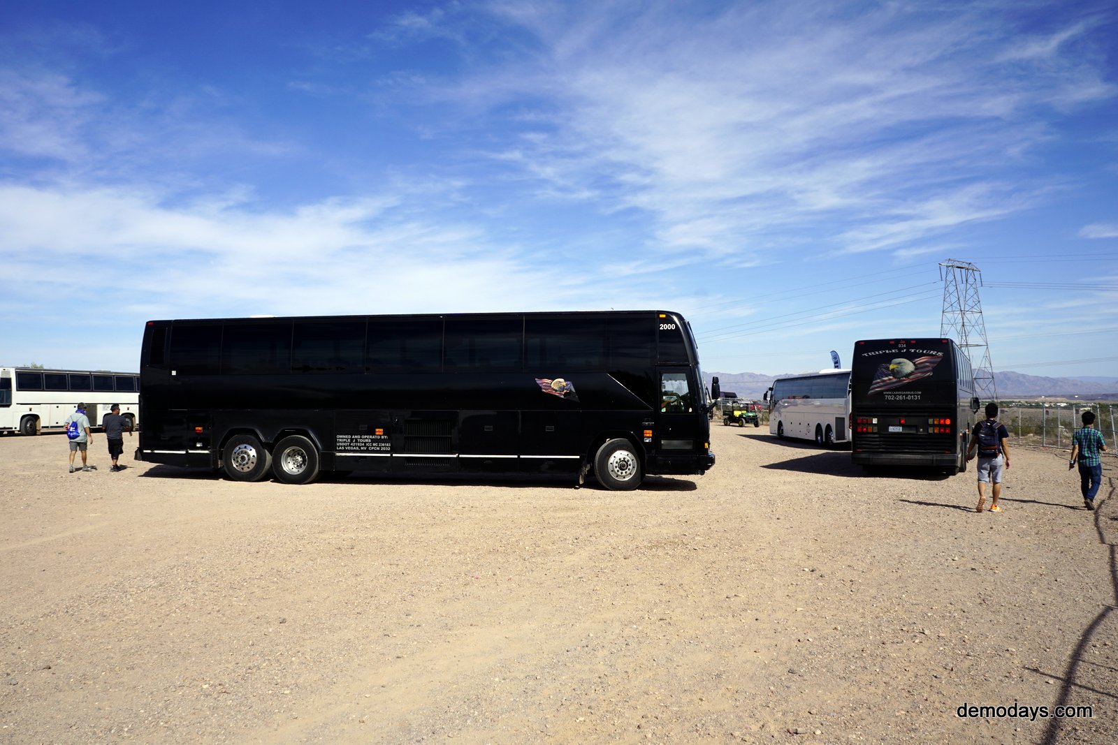 Outdoor Demo Attendees Leave on Buses Back to Vegas